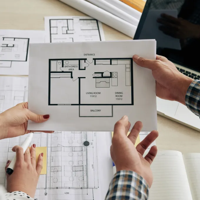 ADU design and planning stage with Los Angeles ADU builders reviewing architectural plans