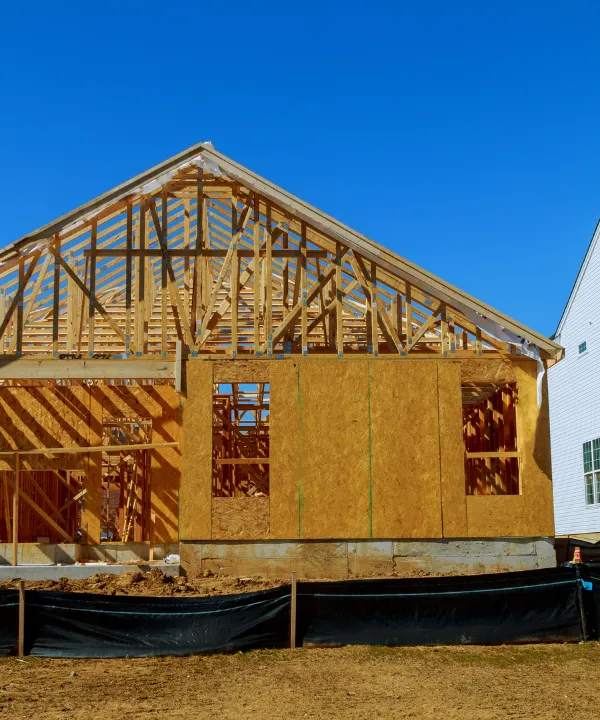 Wood framing stage of accessory dwelling unit construction in Los Angeles backyard